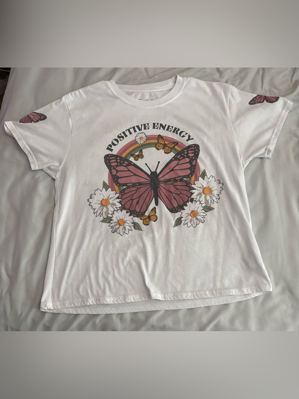 Nicola Bee White Graphic Tee with Accent Floral Design